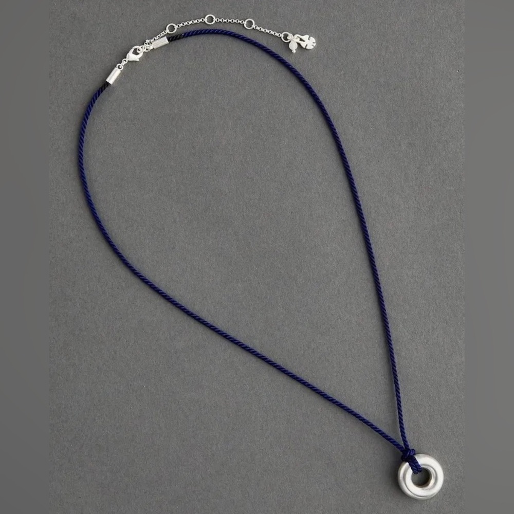 NWT Lucky Brand royal blue and faux silver knotted disc, one size!